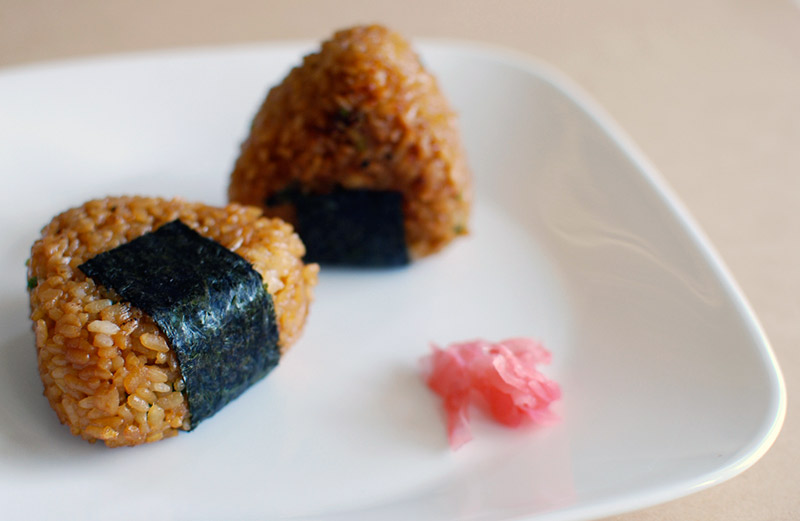 Two yakionigiri on a plate