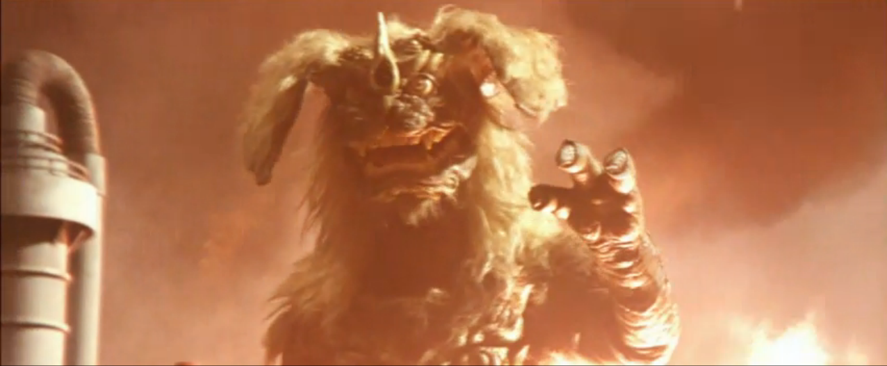 King Caesar kaiju, a shaggy-haired bear dog monster