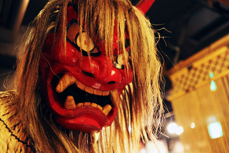Red ogre mask with stringy hair