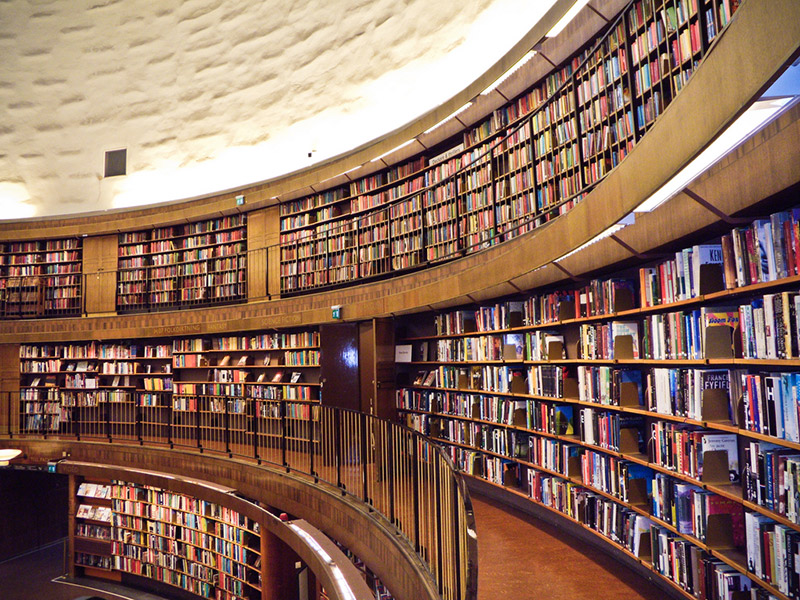 Two floors of books and bookshelves at a library