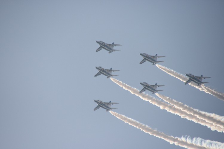 T-4 jets of JASDF Blue Impulse flying overhead