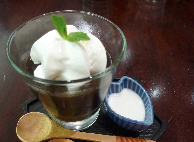 glass cup of coffee jelly with whipped cream