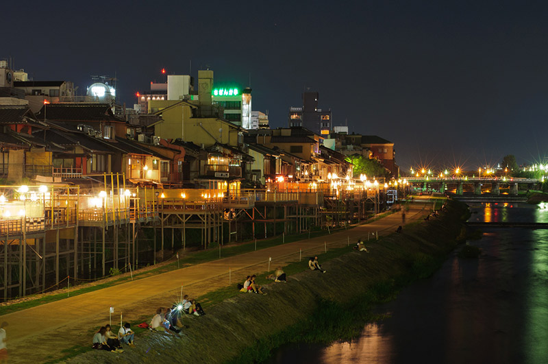 sitting by the canal at night