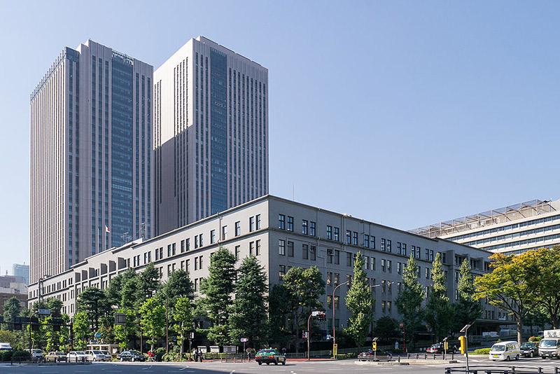 two big buildings blue sky japan ministry of finance