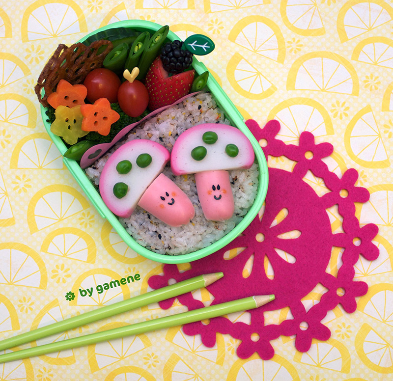 kamaboko bento with pencils rice fruit and vegetables