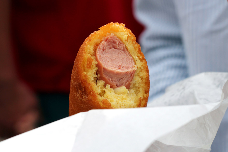 american corn dog half eaten from the top