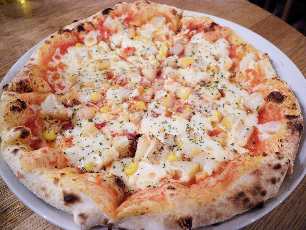 large corn and mayo pizza in japan