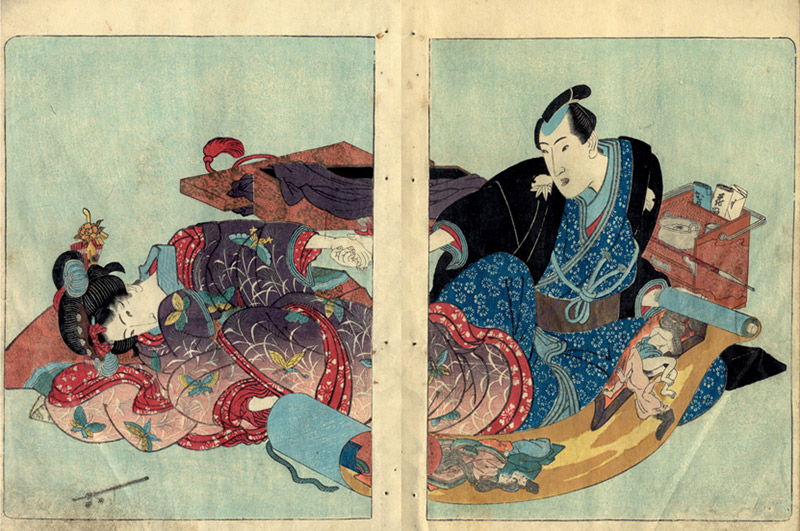 man and woman looking at shunga together