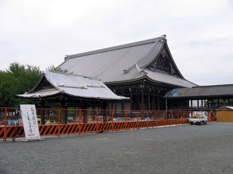 Construction barriers surrounding a temple