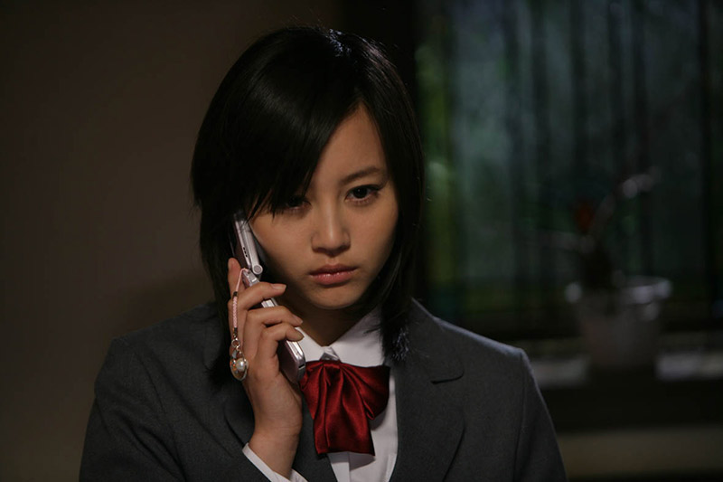 Japanese schoolgirl on cell phone