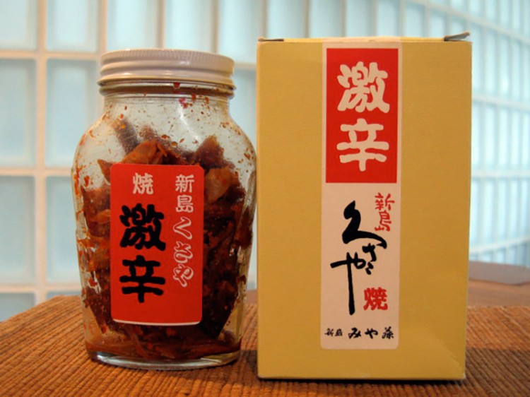 japanese spicy food bottle displayed next to box