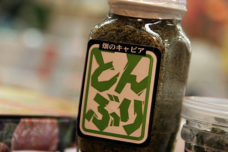 bottle of green paste with japanese writing