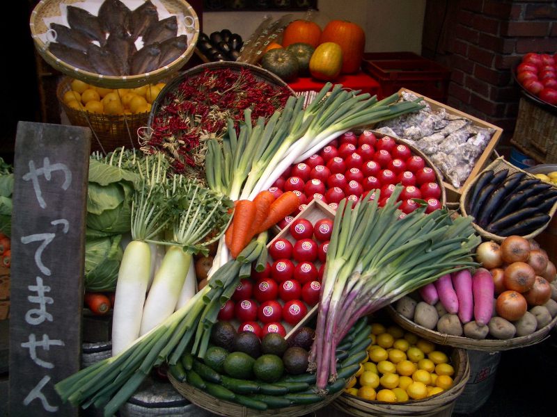 a bounty of vegetable negi in a japanese market