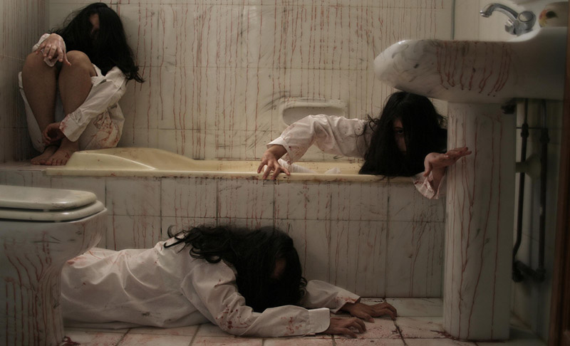 three scary japanese horror movie women in a bathroom