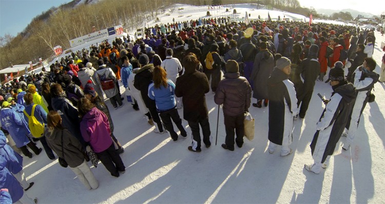 A crowd of people flocking to watch the Yukigassen tournament