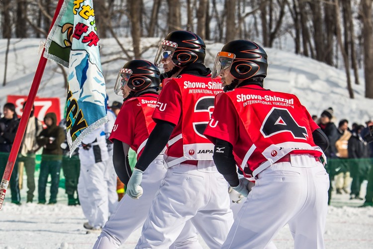 Yukigassen contestants preparing to attack with snowballs