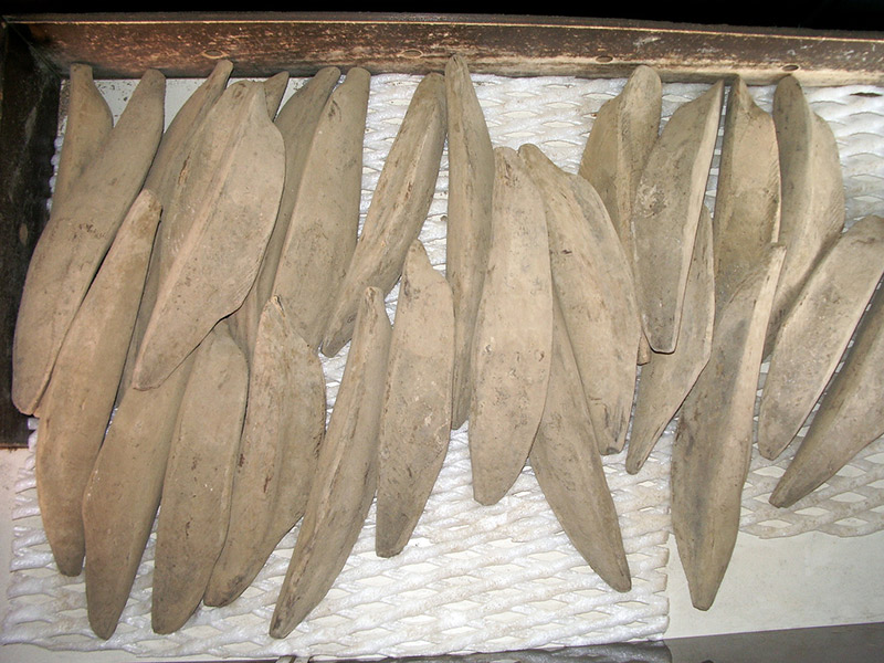 Katsuobushi fermented fish blocks piles up in a crate