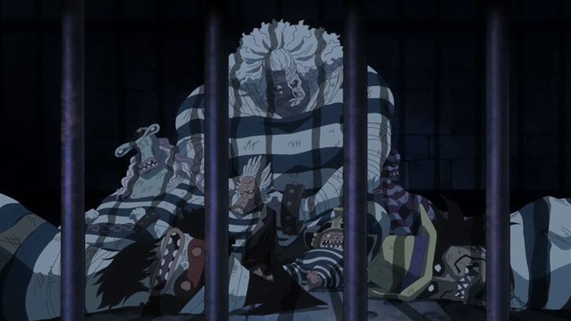 bad guys from one piece sitting in prison at night