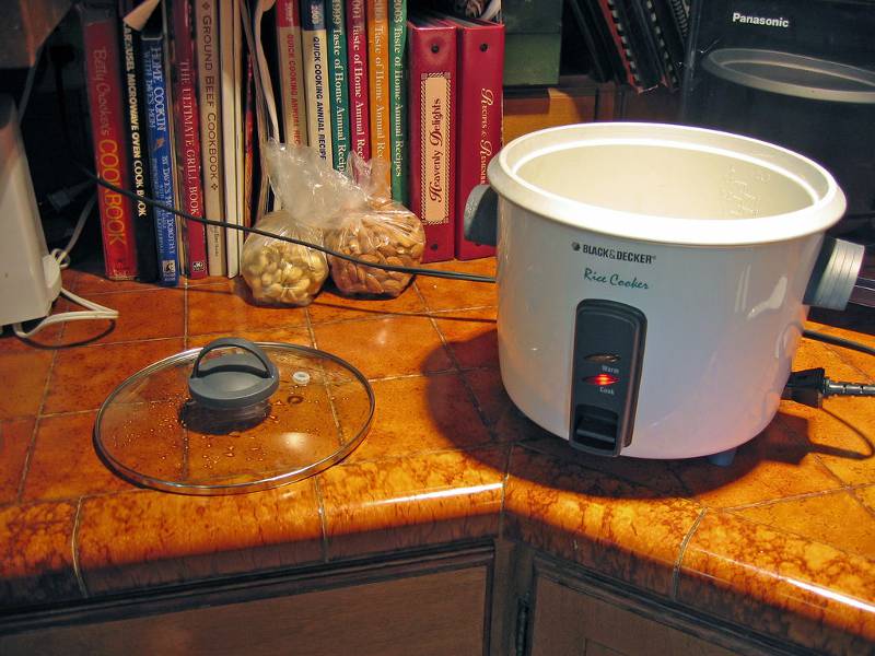 A rice cooker and some cookbooks