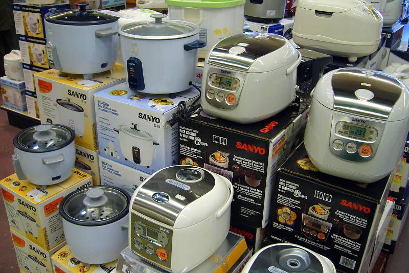 Stacks of rice cookers on display