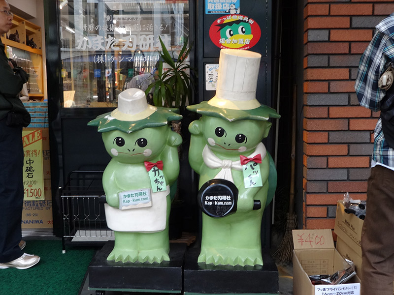 two cute welcoming kappa statues