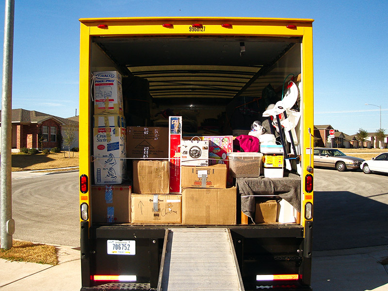 Rear view of a packed boxtruck with the shutter open