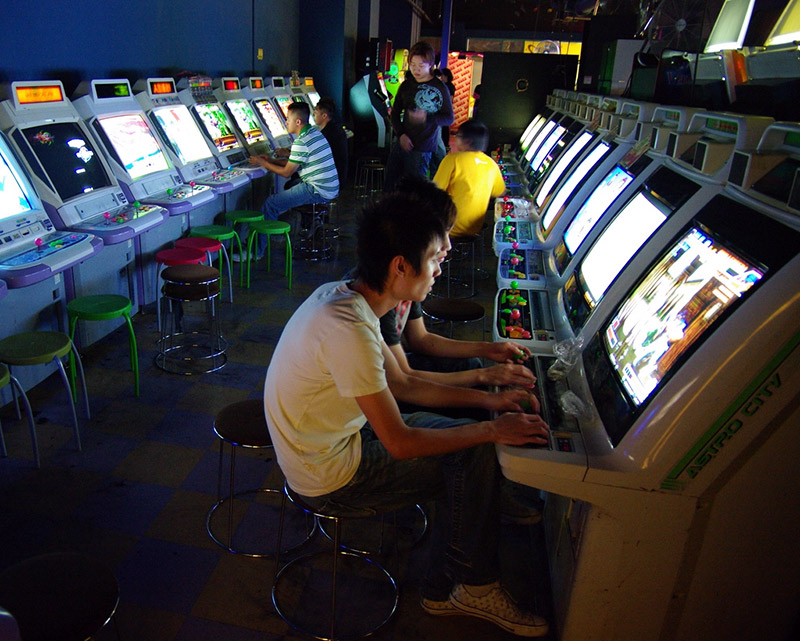 Japanese men at gaming stations