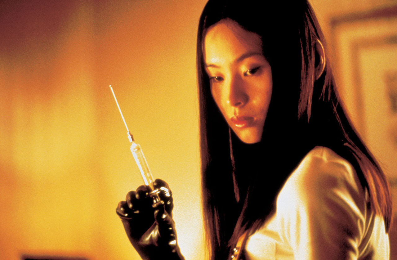 woman holding needle from japanese horror movie audition