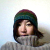 Japanese woman with a beanie and turtleneck