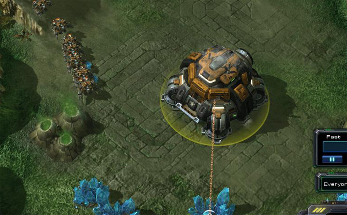 Starcraft 2's Orbital Japanese Learning Command building contemplating expansion