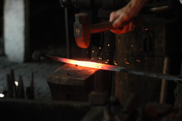 blacksmith hammer on an anvil