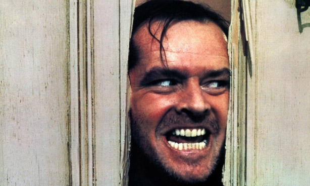 Jack Nicholson pearing through door from movie the Shining