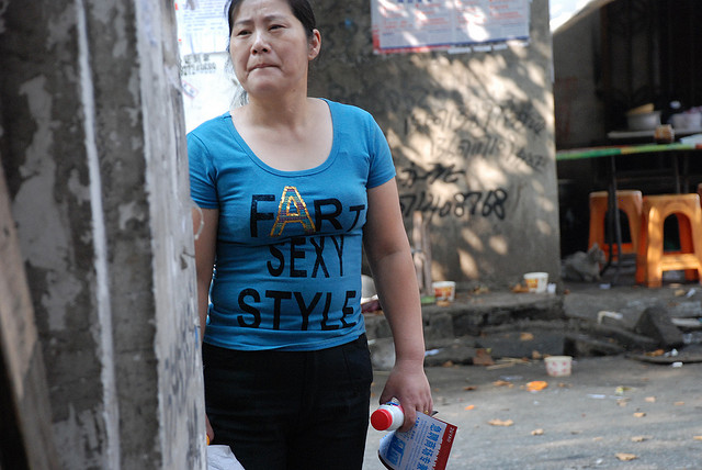 unsuspecting woman with inappropriate tshirt