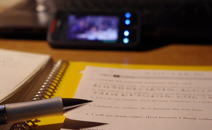 closeup of pen and spiral notebook