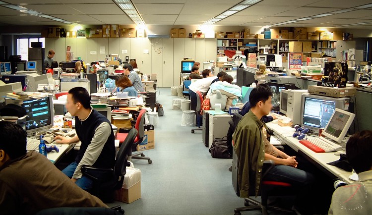 Japanese office workers at their desks