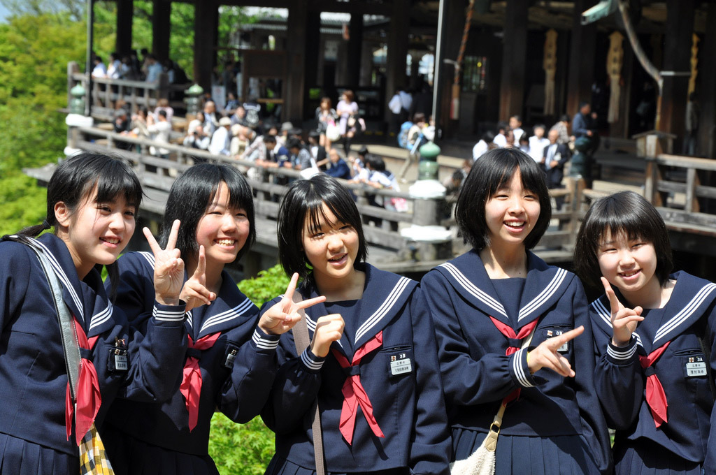 japanese schoolgirls posing for a picture