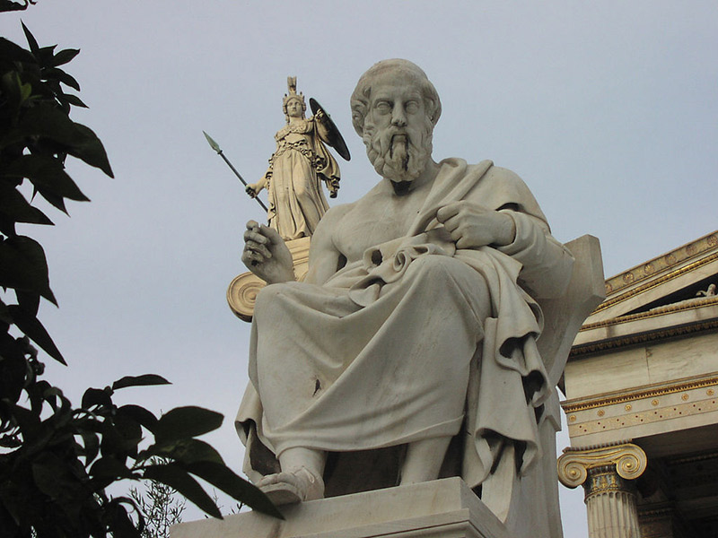 A statue of Socrates seated