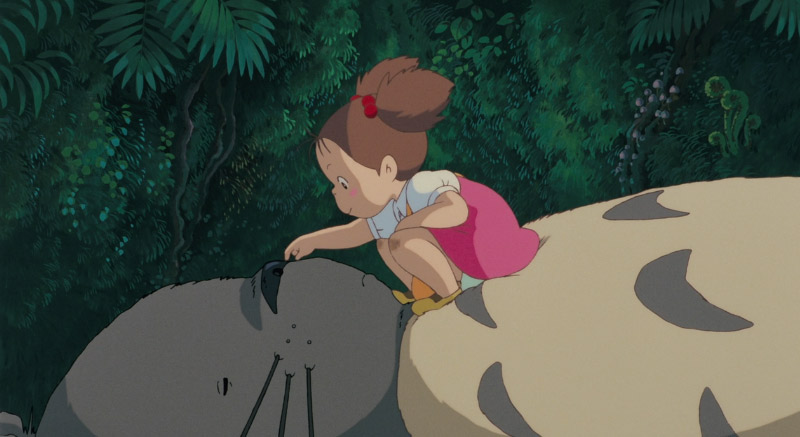Girl sitting on Totoro