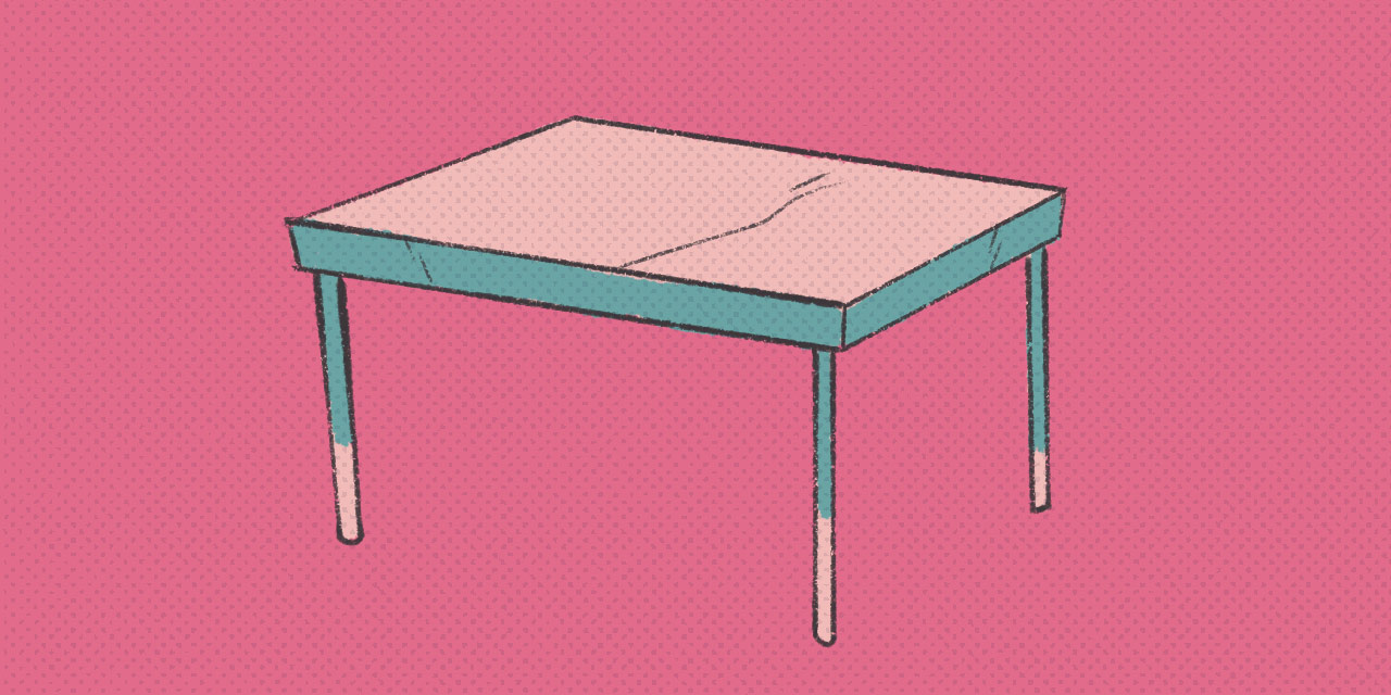 table with blue trim on a pink background