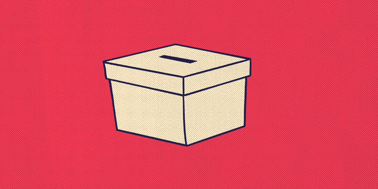 a ballot box with a hole cut in the lid