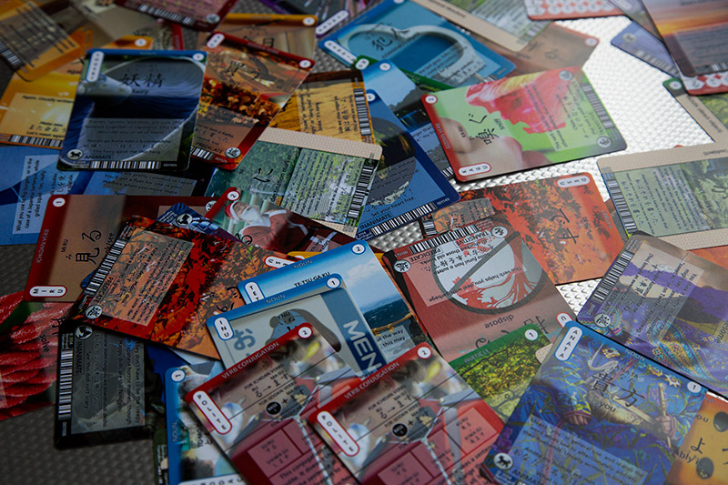 JTG cards spread out on a table