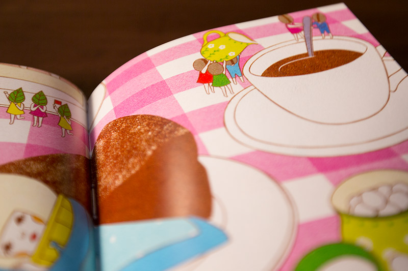 a table taken over by activity in ice cream work