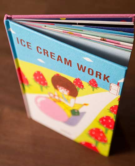 _Ice Cream Work_ by Naoshi standing upright on a desk