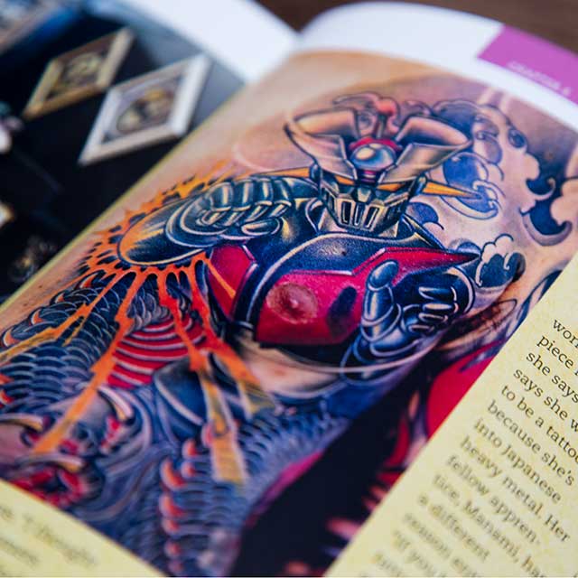 mazinger z tattoo in a book