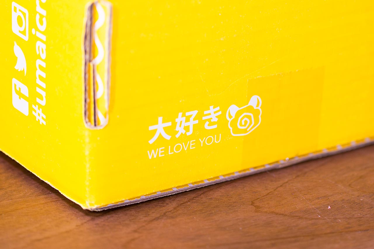 text on the side of umai crate that says i love you