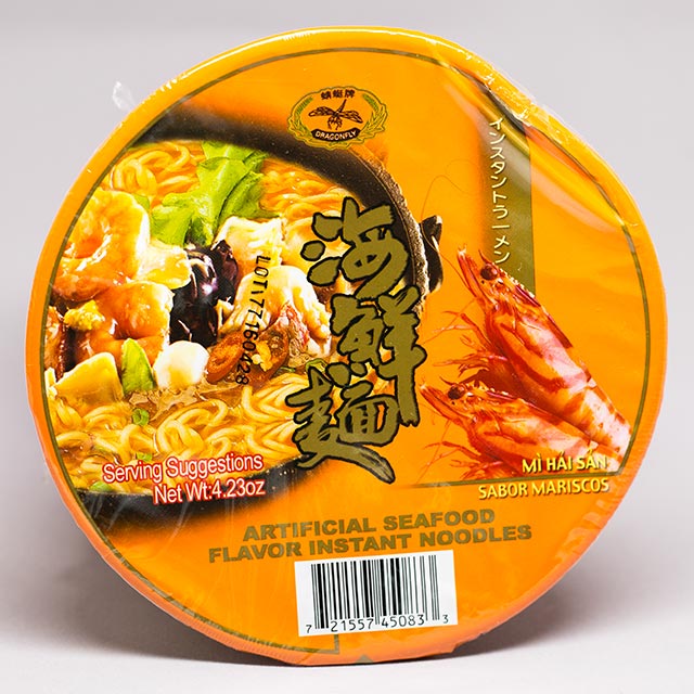 yellow package of instant ramen with a dent in the side