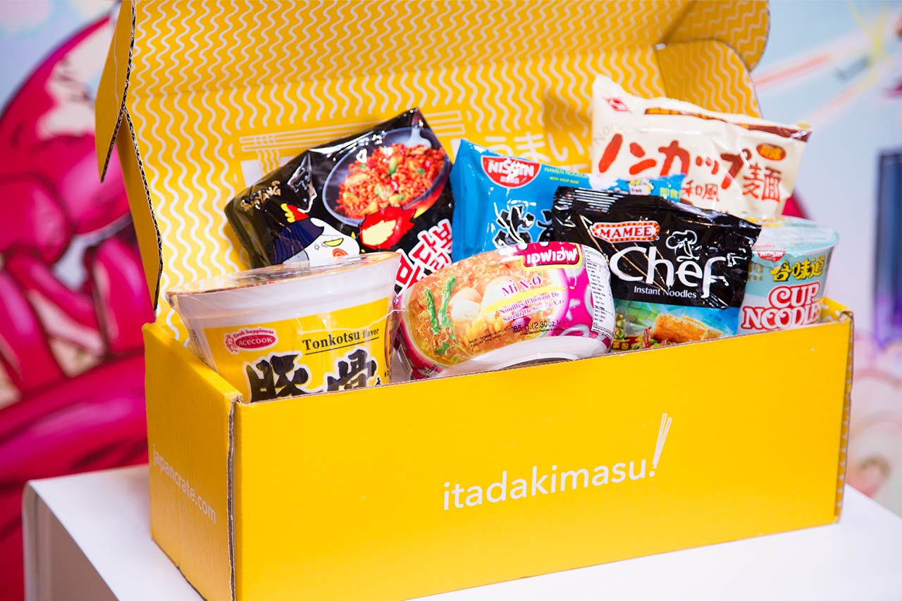 open umai crate box displaying packages of japanese instant noodles