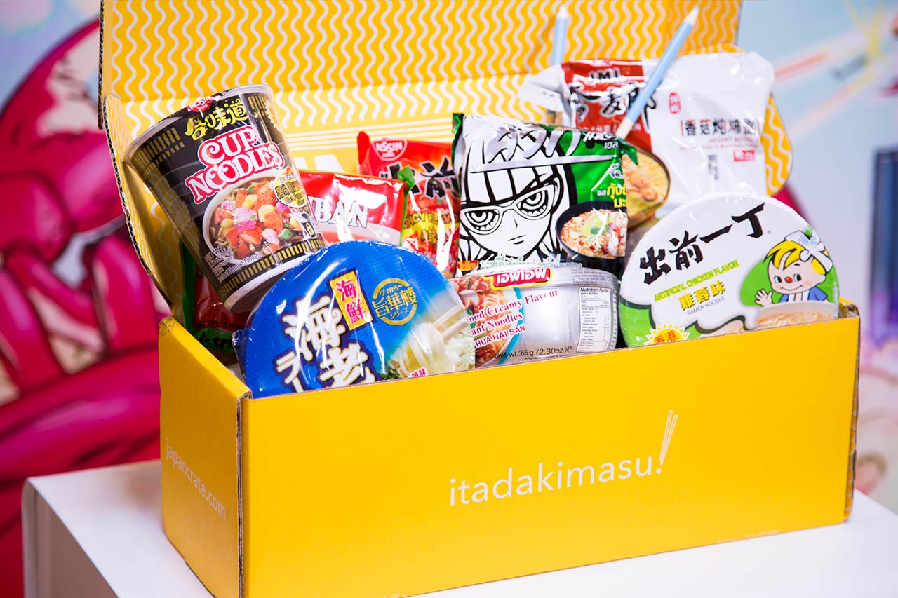 big yellow umai crate subscription box open showing instant noodles