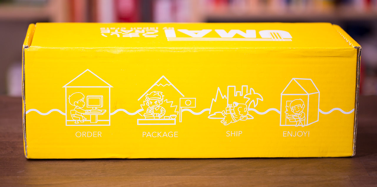 side of umai crate displaying illustration