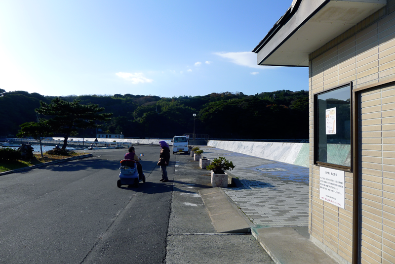 citizens of tashirjima waiting for the ferry